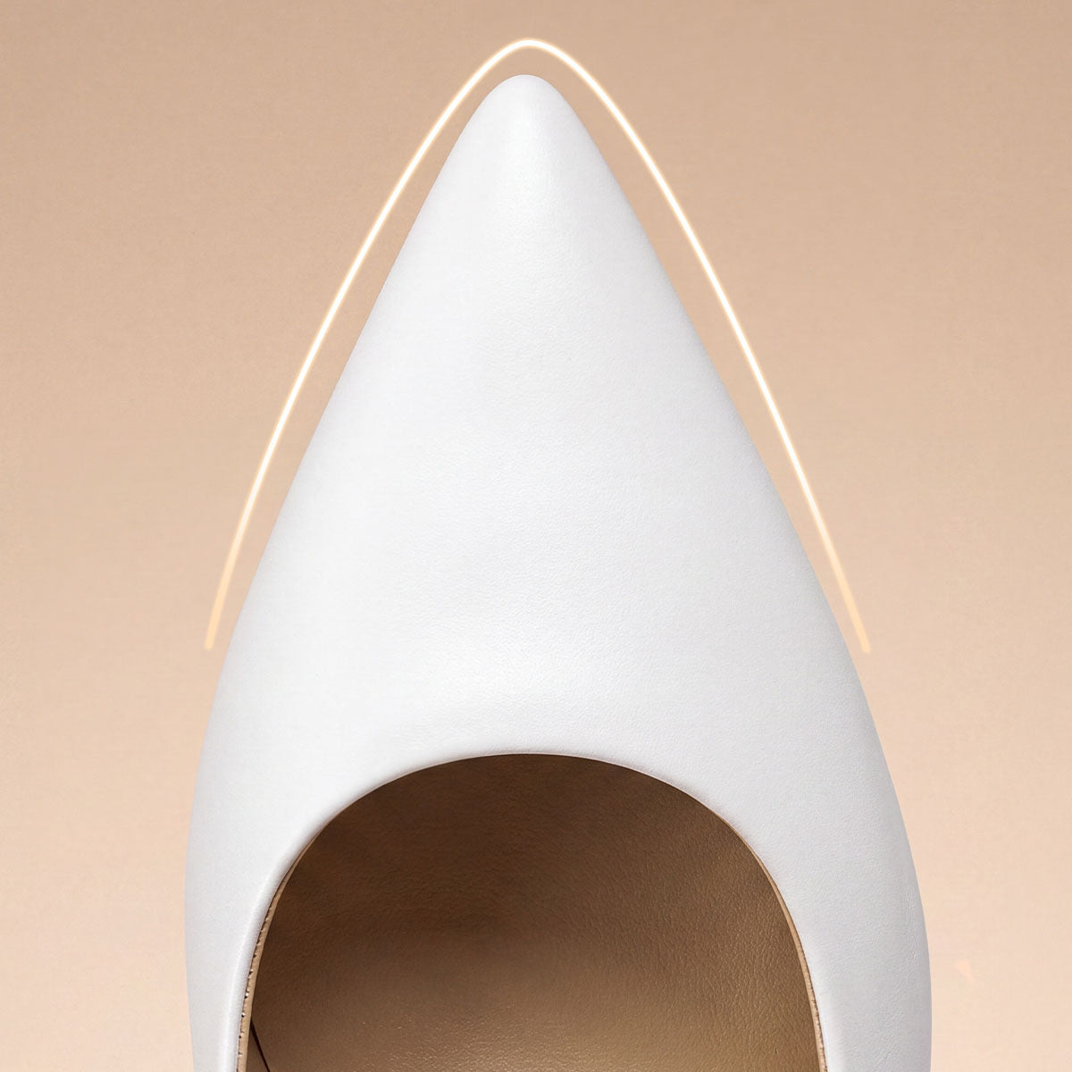 Close-up of the pointed toe on a white pump